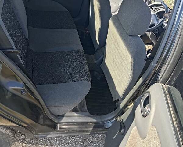 Черный Дэу Ланос, объемом двигателя 1.6 л и пробегом 271 тыс. км за 2000 $, фото 11 на Automoto.ua