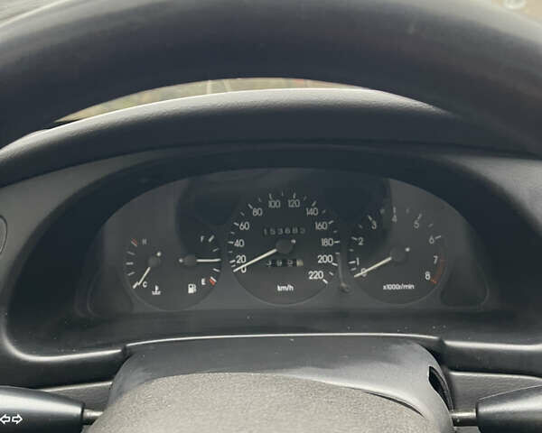 Черный Дэу Ланос, объемом двигателя 1.5 л и пробегом 150 тыс. км за 2000 $, фото 1 на Automoto.ua