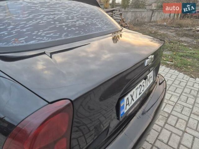 Деу Ланос 2007 у Новомосковске на Automoto.ua Чорний Деу Ланос, об'ємом двигуна 1.5 л та пробігом 252 тис. км за 2500 $, фото 9 на Automoto.ua