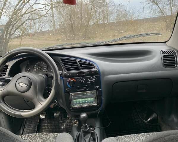 Деу Ланос 2007 у Тернополі на Automoto.ua Чорний Деу Ланос, об'ємом двигуна 1.5 л та пробігом 219 тис. км за 2100 $, фото 8 на Automoto.ua