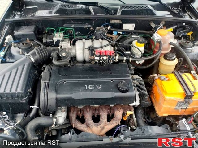 Черный Дэу Ланос, объемом двигателя 1.6 л и пробегом 200 тыс. км за 1600 $, фото 8 на Automoto.ua