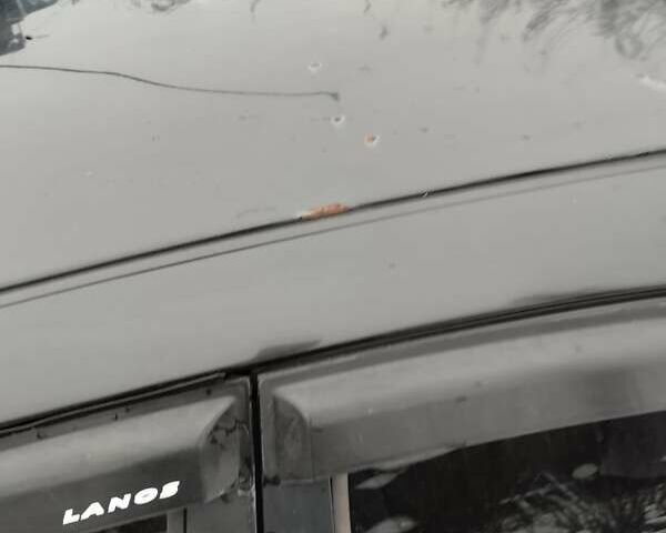 Черный Дэу Ланос, объемом двигателя 1.5 л и пробегом 145 тыс. км за 1200 $, фото 3 на Automoto.ua