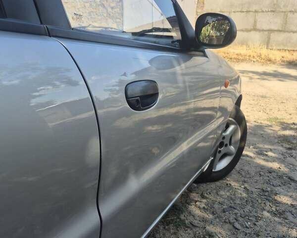 Черный Дэу Ланос, объемом двигателя 1.5 л и пробегом 255 тыс. км за 2500 $, фото 5 на Automoto.ua