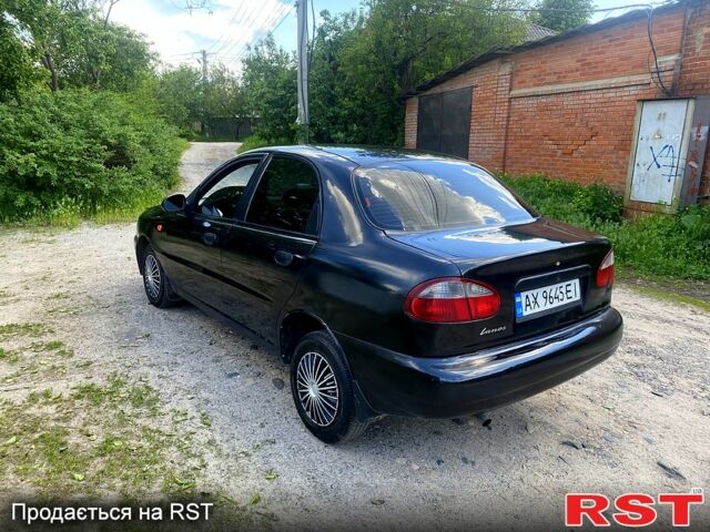 Черный Дэу Ланос, объемом двигателя 1.5 л и пробегом 200 тыс. км за 1850 $, фото 2 на Automoto.ua