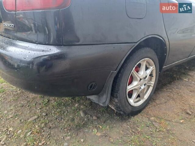 Черный Дэу Ланос, объемом двигателя 1.5 л и пробегом 158 тыс. км за 1250 $, фото 2 на Automoto.ua