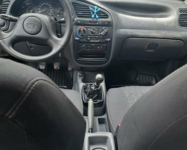 Черный Дэу Ланос, объемом двигателя 1.5 л и пробегом 158 тыс. км за 1250 $, фото 12 на Automoto.ua