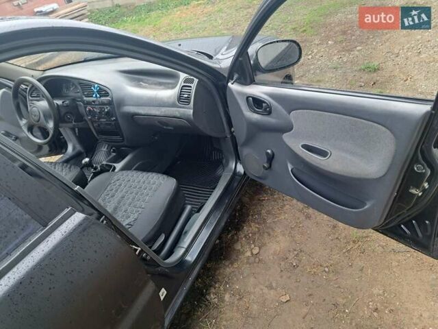 Черный Дэу Ланос, объемом двигателя 1.5 л и пробегом 158 тыс. км за 1250 $, фото 15 на Automoto.ua