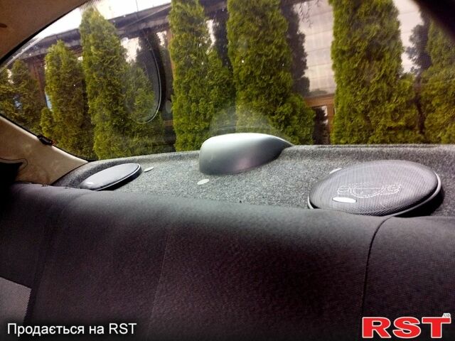 Черный Дэу Ланос, объемом двигателя 1.6 л и пробегом 249 тыс. км за 3500 $, фото 8 на Automoto.ua