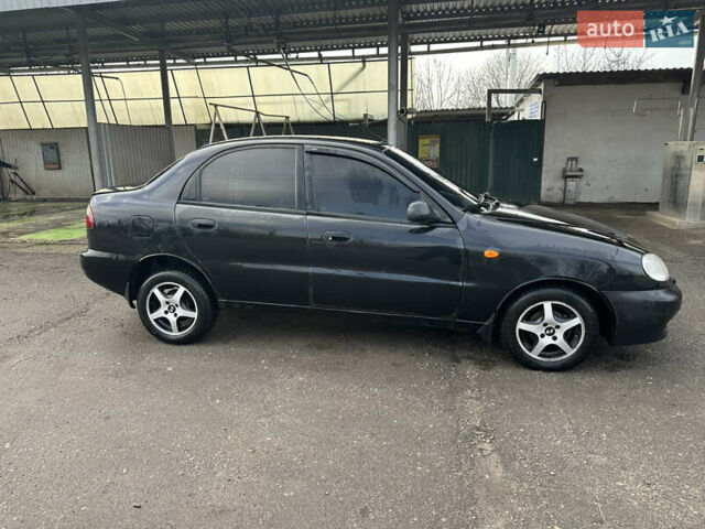 Чорний Деу Ланос, об'ємом двигуна 1.5 л та пробігом 150 тис. км за 1700 $, фото 3 на Automoto.ua