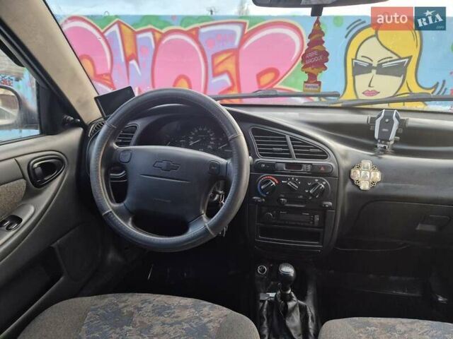 Деу Ланос 2007 у Новомосковске на Automoto.ua Чорний Деу Ланос, об'ємом двигуна 1.5 л та пробігом 252 тис. км за 2500 $, фото 17 на Automoto.ua