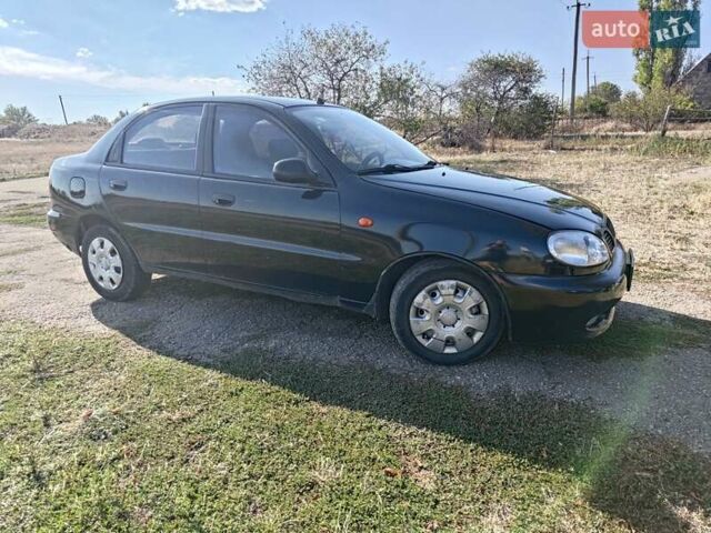 Черный Дэу Ланос, объемом двигателя 1.6 л и пробегом 271 тыс. км за 2000 $, фото 10 на Automoto.ua