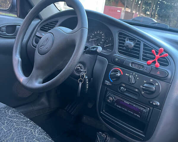 Деу Ланос 2007 у Черняхове на Automoto.ua Чорний Деу Ланос, об'ємом двигуна 1.5 л та пробігом 113 тис. км за 2700 $, фото 6 на Automoto.ua