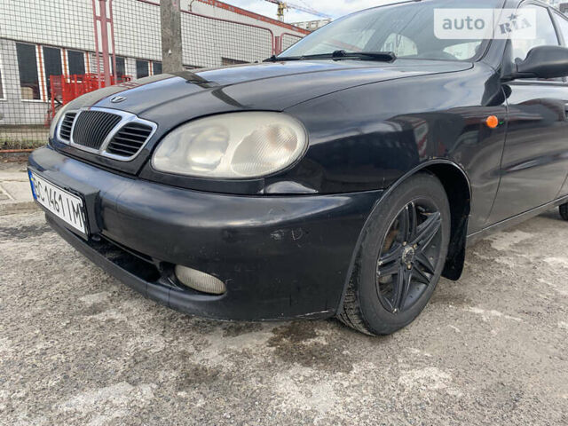 Черный Дэу Ланос, объемом двигателя 1.5 л и пробегом 280 тыс. км за 1300 $, фото 1 на Automoto.ua