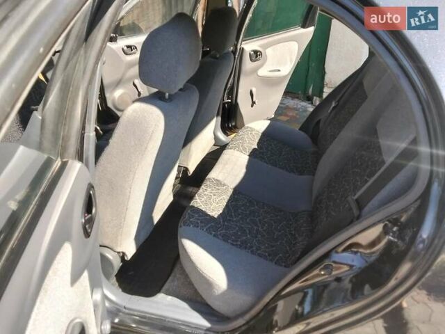 Чорний Деу Ланос, об'ємом двигуна 1.5 л та пробігом 255 тис. км за 2300 $, фото 6 на Automoto.ua