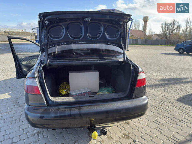 Чорний Деу Ланос, об'ємом двигуна 1.5 л та пробігом 201 тис. км за 1700 $, фото 4 на Automoto.ua