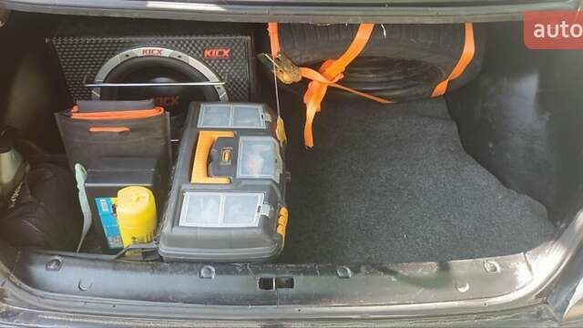 Черный Дэу Ланос, объемом двигателя 1.5 л и пробегом 236 тыс. км за 2300 $, фото 3 на Automoto.ua