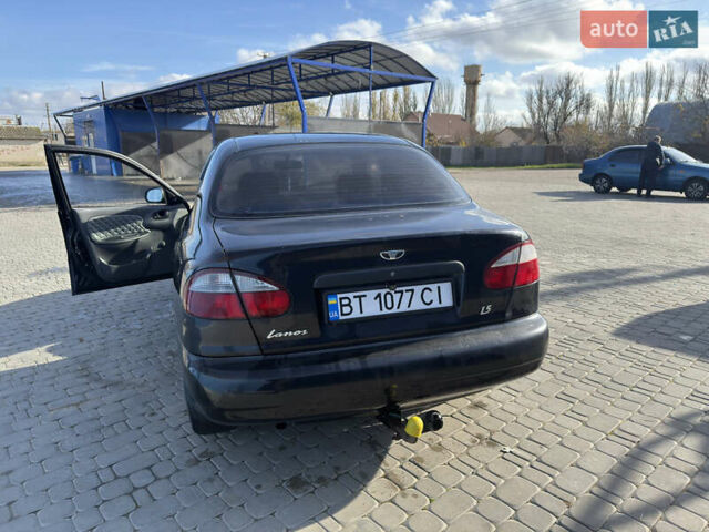 Чорний Деу Ланос, об'ємом двигуна 1.5 л та пробігом 201 тис. км за 1700 $, фото 3 на Automoto.ua