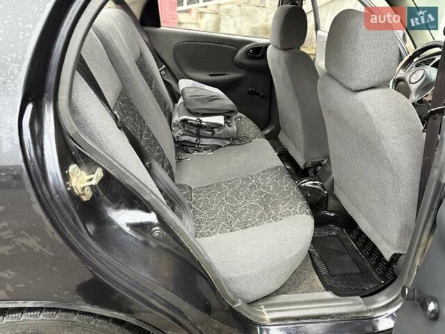 Черный Дэу Ланос, объемом двигателя 0 л и пробегом 150 тыс. км за 1250 $, фото 4 на Automoto.ua