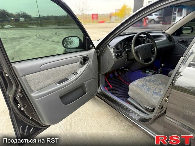 Чорний Деу Ланос, об'ємом двигуна 1.5 л та пробігом 240 тис. км за 2750 $, фото 6 на Automoto.ua