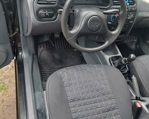Черный Дэу Ланос, объемом двигателя 1.5 л и пробегом 158 тыс. км за 1250 $, фото 9 на Automoto.ua