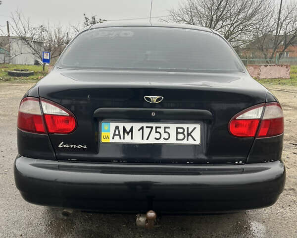 Черный Дэу Ланос, объемом двигателя 1.5 л и пробегом 201 тыс. км за 1000 $, фото 3 на Automoto.ua