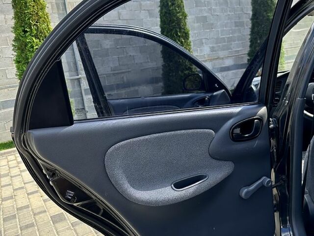 Черный Дэу Ланос, объемом двигателя 1.5 л и пробегом 176 тыс. км за 2899 $, фото 6 на Automoto.ua