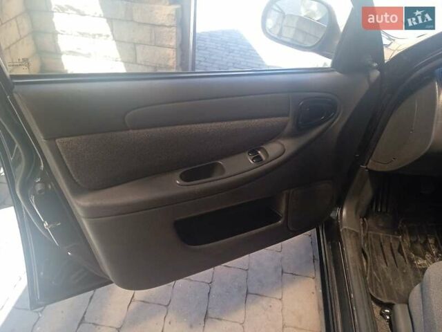 Черный Дэу Ланос, объемом двигателя 1.5 л и пробегом 102 тыс. км за 2999 $, фото 8 на Automoto.ua