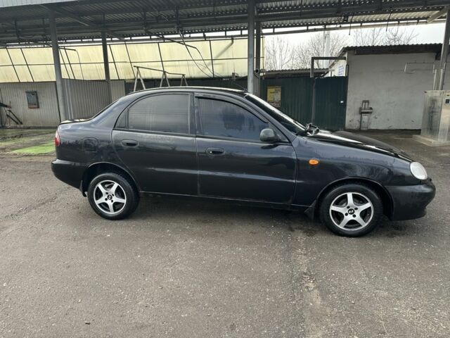 Черный Дэу Ланос, объемом двигателя 1.5 л и пробегом 150 тыс. км за 1700 $, фото 3 на Automoto.ua