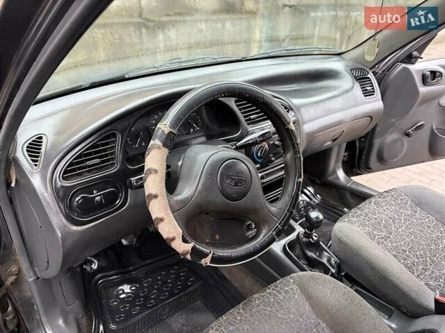 Черный Дэу Ланос, объемом двигателя 0 л и пробегом 150 тыс. км за 1250 $, фото 7 на Automoto.ua