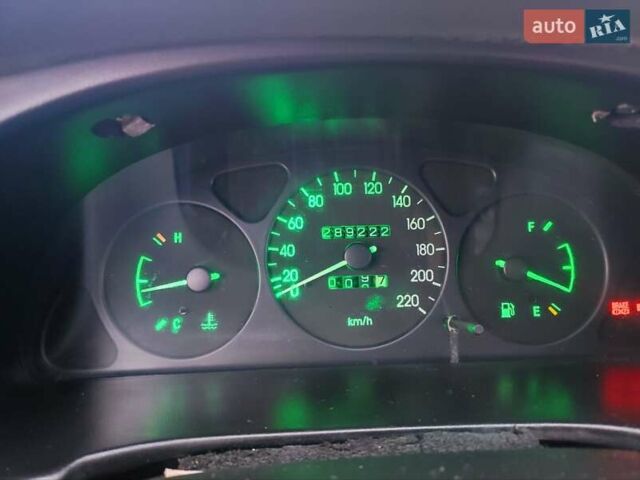 Черный Дэу Ланос, объемом двигателя 1.5 л и пробегом 289 тыс. км за 1700 $, фото 2 на Automoto.ua