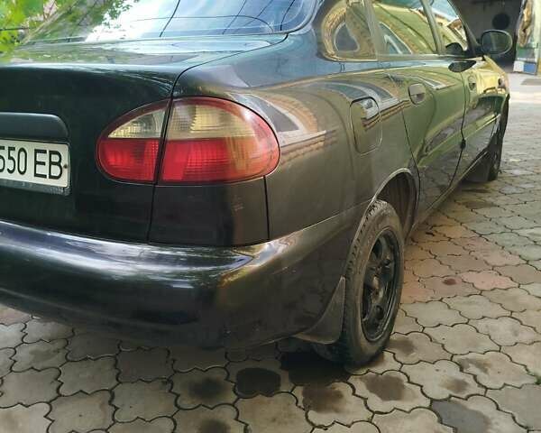 Черный Дэу Ланос, объемом двигателя 1.5 л и пробегом 270 тыс. км за 2850 $, фото 14 на Automoto.ua