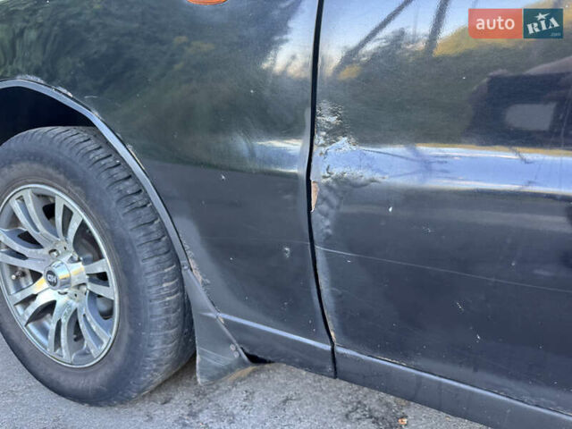 Чорний Деу Ланос, об'ємом двигуна 1.5 л та пробігом 200 тис. км за 1350 $, фото 16 на Automoto.ua