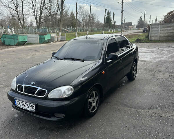 Чорний Деу Ланос, об'ємом двигуна 1.5 л та пробігом 150 тис. км за 1700 $, фото 1 на Automoto.ua
