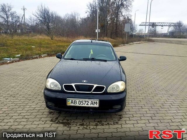 Черный Дэу Ланос, объемом двигателя 1.6 л и пробегом 200 тыс. км за 1600 $, фото 5 на Automoto.ua