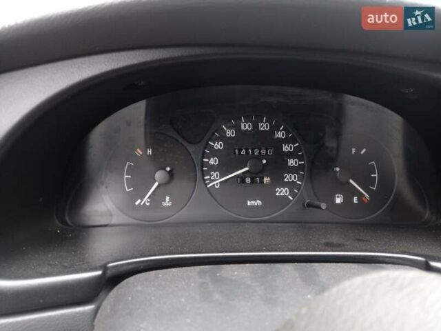 Черный Дэу Ланос, объемом двигателя 1.5 л и пробегом 141 тыс. км за 1700 $, фото 8 на Automoto.ua