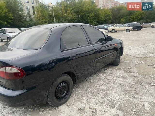 Чорний Деу Ланос, об'ємом двигуна 1.39 л та пробігом 200 тис. км за 1850 $, фото 4 на Automoto.ua