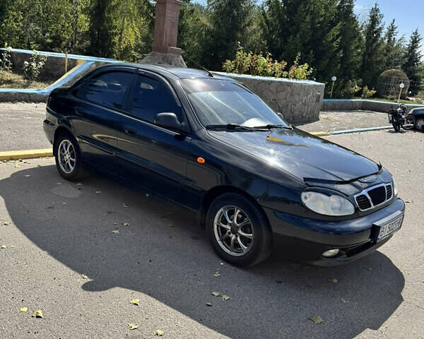Черный Дэу Ланос, объемом двигателя 1.5 л и пробегом 175 тыс. км за 2800 $, фото 1 на Automoto.ua