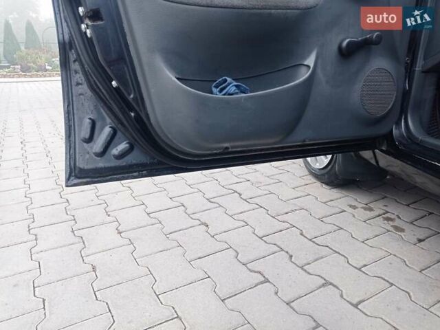 Чорний Деу Ланос, об'ємом двигуна 1.5 л та пробігом 220 тис. км за 2200 $, фото 8 на Automoto.ua