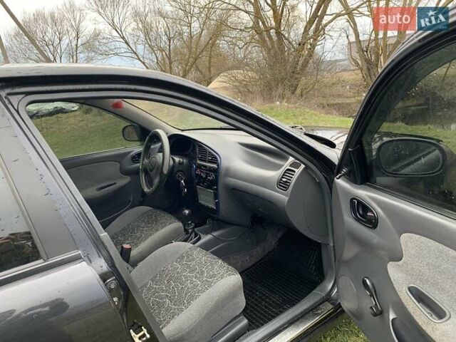 Деу Ланос 2007 у Тернополі на Automoto.ua Чорний Деу Ланос, об'ємом двигуна 1.5 л та пробігом 219 тис. км за 2100 $, фото 7 на Automoto.ua