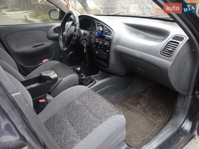 Черный Дэу Ланос, объемом двигателя 1.5 л и пробегом 141 тыс. км за 1700 $, фото 5 на Automoto.ua
