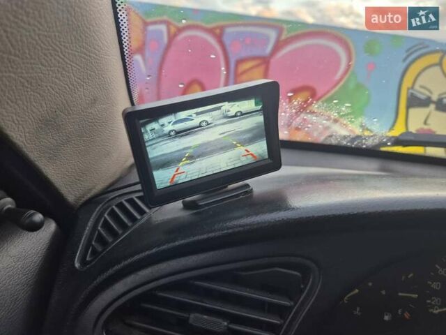 Деу Ланос 2007 у Новомосковске на Automoto.ua Чорний Деу Ланос, об'ємом двигуна 1.5 л та пробігом 252 тис. км за 2500 $, фото 18 на Automoto.ua