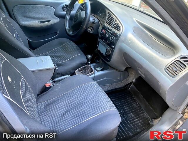 Черный Дэу Ланос, объемом двигателя 1.5 л и пробегом 200 тыс. км за 1850 $, фото 7 на Automoto.ua