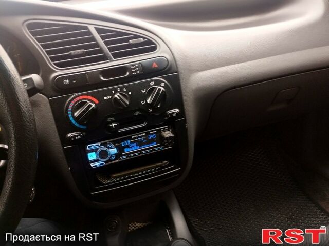 Черный Дэу Ланос, объемом двигателя 1.6 л и пробегом 249 тыс. км за 3500 $, фото 5 на Automoto.ua