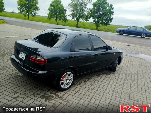 Черный Дэу Ланос, объемом двигателя 1.6 л и пробегом 249 тыс. км за 3500 $, фото 4 на Automoto.ua