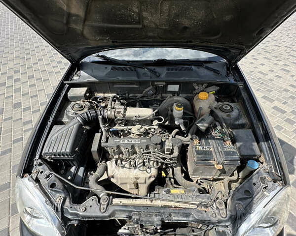 Деу Ланос 2007 у Кропивницькому (Кіровограді) на Automoto.ua Чорний Деу Ланос, об'ємом двигуна 1.5 л та пробігом 180 тис. км за 2899 $, фото 13 на Automoto.ua