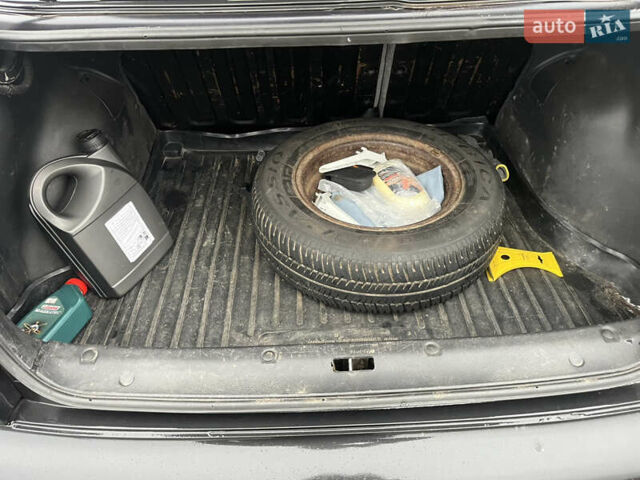 Черный Дэу Ланос, объемом двигателя 1.5 л и пробегом 201 тыс. км за 1000 $, фото 14 на Automoto.ua