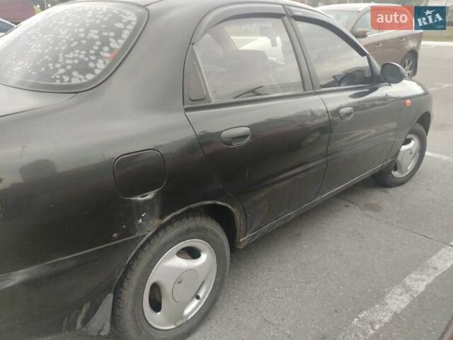 Черный Дэу Ланос, объемом двигателя 1.5 л и пробегом 142 тыс. км за 1500 $, фото 4 на Automoto.ua
