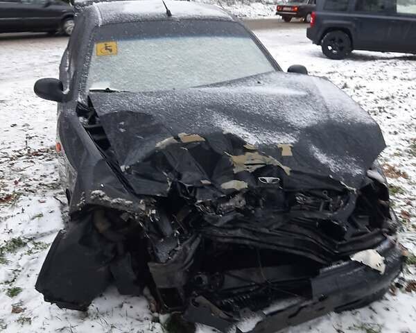 Черный Дэу Ланос, объемом двигателя 1.5 л и пробегом 280 тыс. км за 1200 $, фото 2 на Automoto.ua