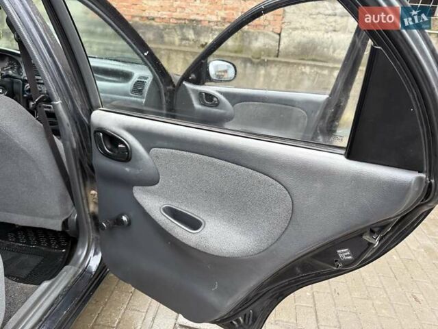 Черный Дэу Ланос, объемом двигателя 0 л и пробегом 150 тыс. км за 1250 $, фото 3 на Automoto.ua