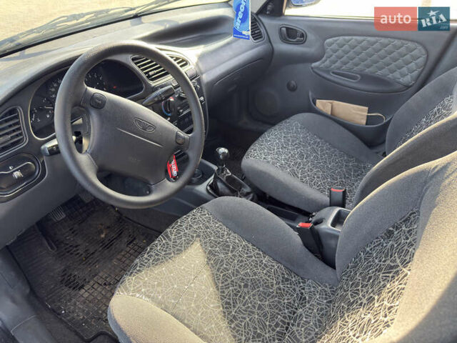 Чорний Деу Ланос, об'ємом двигуна 1.5 л та пробігом 201 тис. км за 1700 $, фото 2 на Automoto.ua